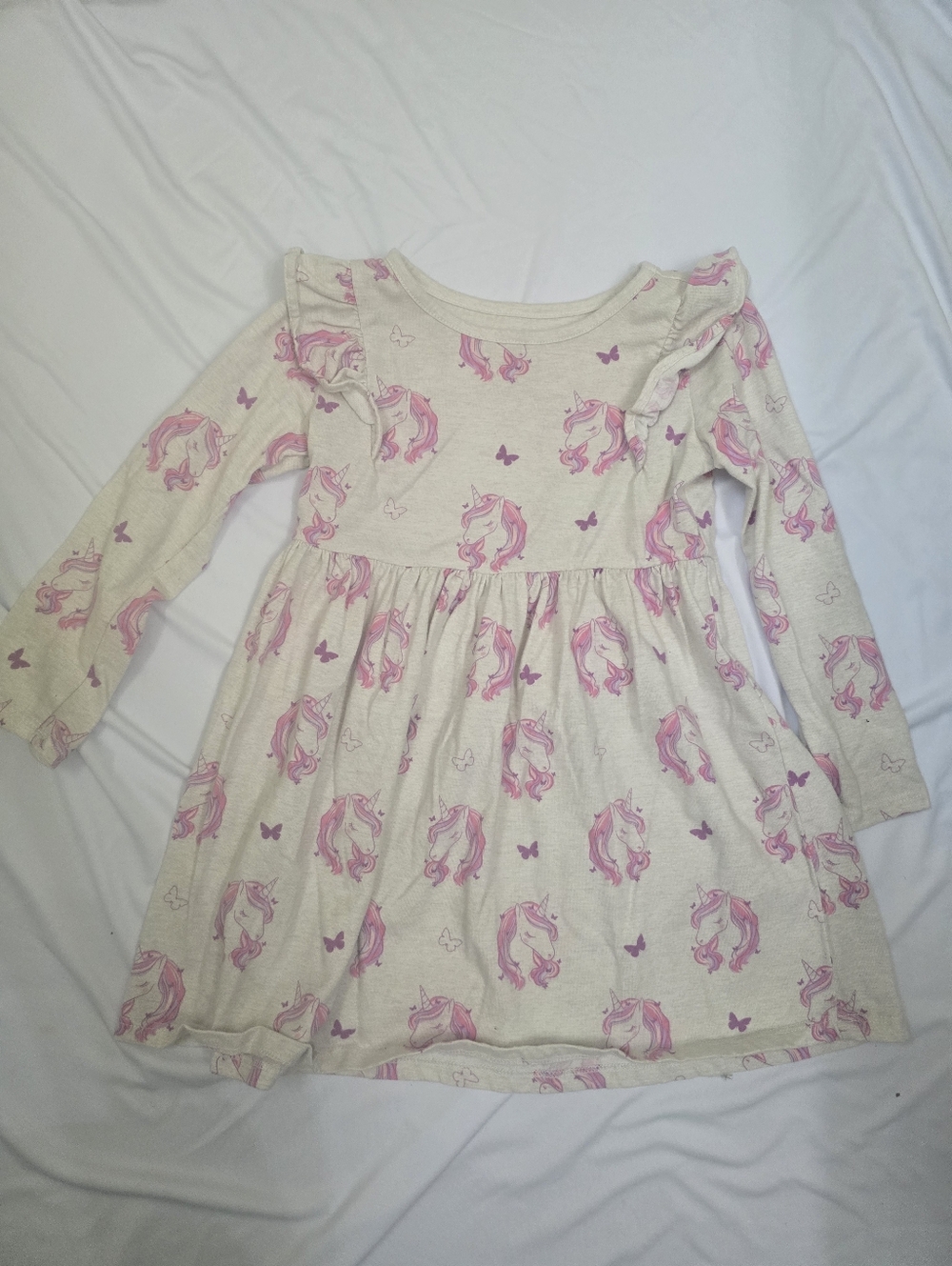 2 Girl Dresses. One with unicorns The Other One With Apples